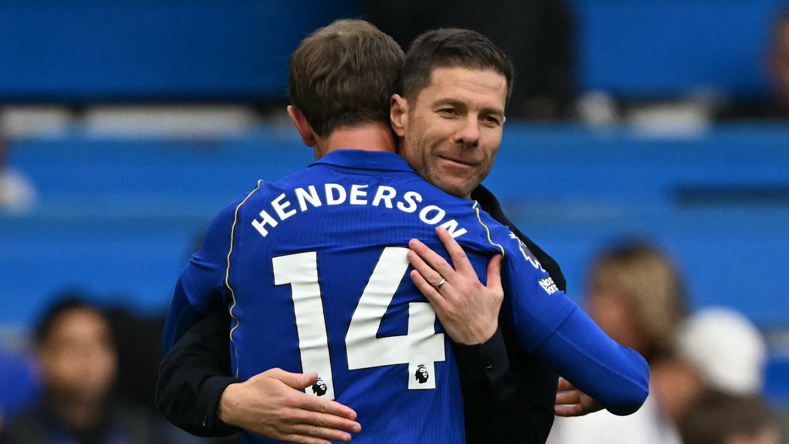 Xabi Alonso embraces Jordan Henderson after Chelsea beat Bournemouth