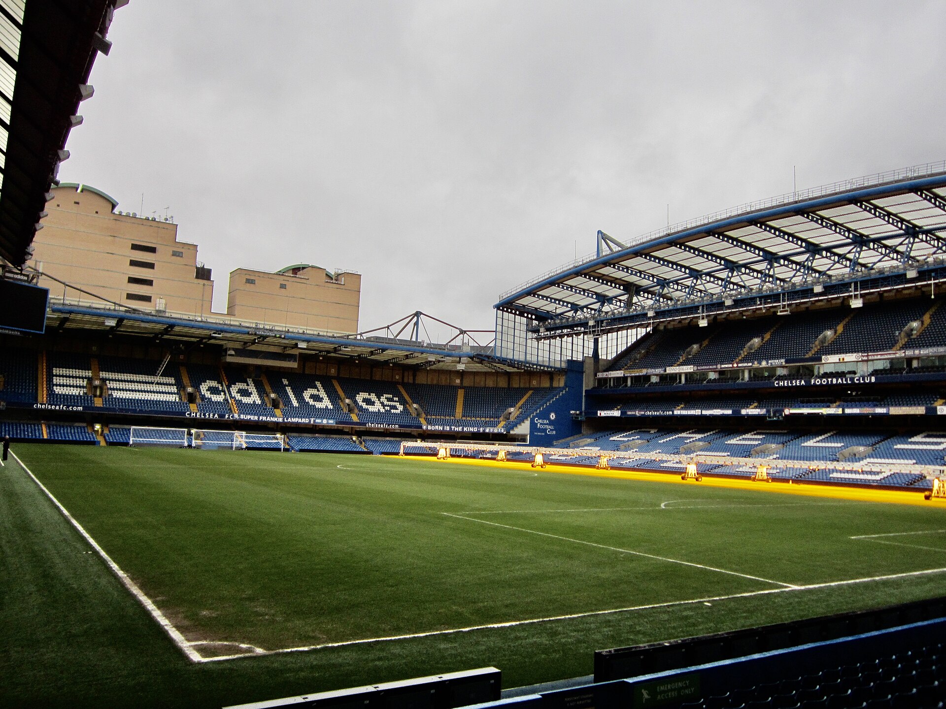 The Stamford Bridge pitch and stands under a grey sky